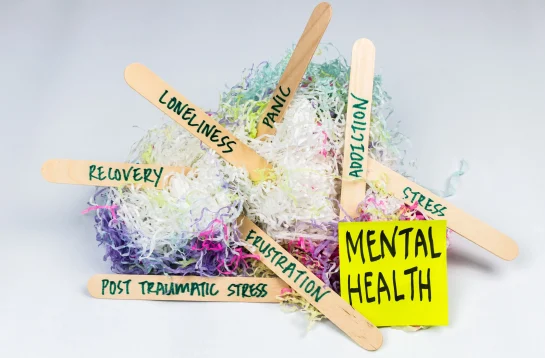 lollipop sticks with mental health words on them